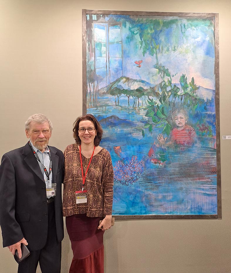 Nikolai Kuzmin with Carole Melmoux-Fanfan, head of his Inevitable Figuration group,, with her painting at Comparisons annual exhibition 2024, at ephemeral Grand Palais (Art Capital 2024).